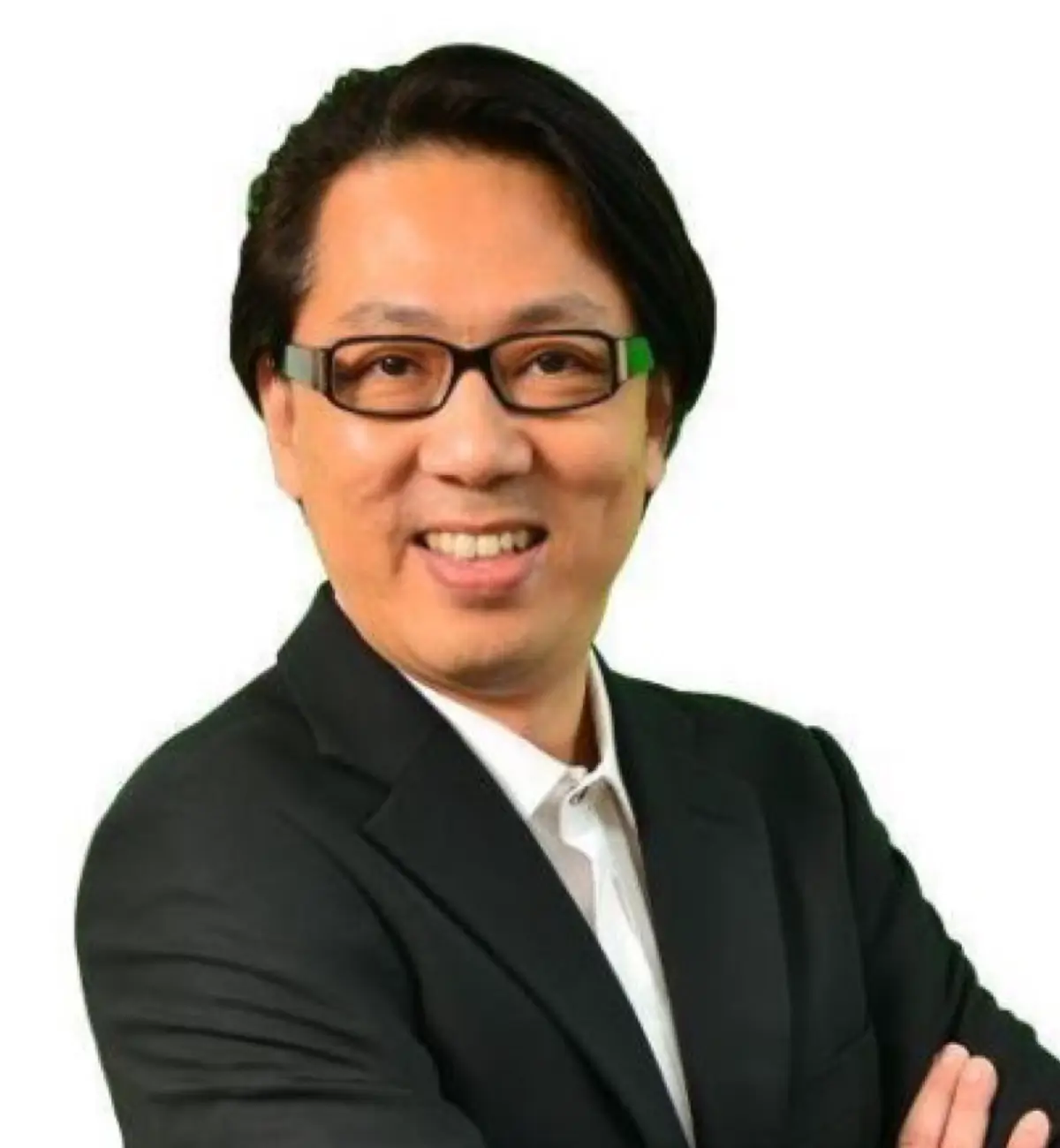 Professional portrait of a smiling man in a black suit, promoting Nippon Paint's commitment to innovation and quality in the paint industry.