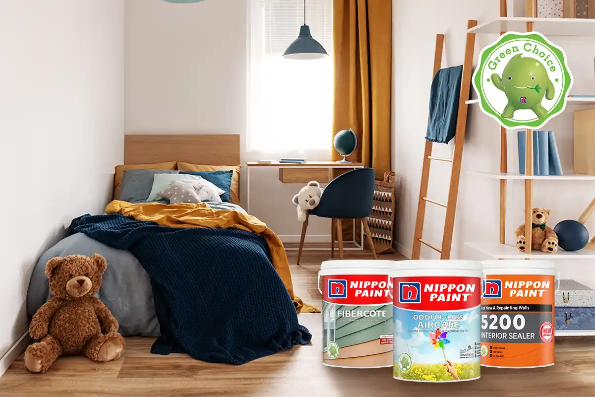 Cozy bedroom featuring a blue and mustard color scheme, with a bed adorned with pillows and a teddy bear. Displayed are Nippon Paint products: FiberCote, Odour-Less AirCare, and 5200 Interior Sealer, highlighting eco-friendly options for home decor.