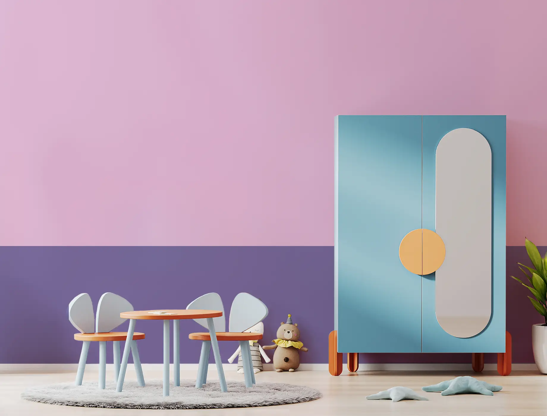 Bright and playful children's room featuring a pink and purple wall design using Nippon Paint, complemented by a modern blue wardrobe and a round table with colorful chairs. Soft textures and playful decor enhance the inviting atmosphere.