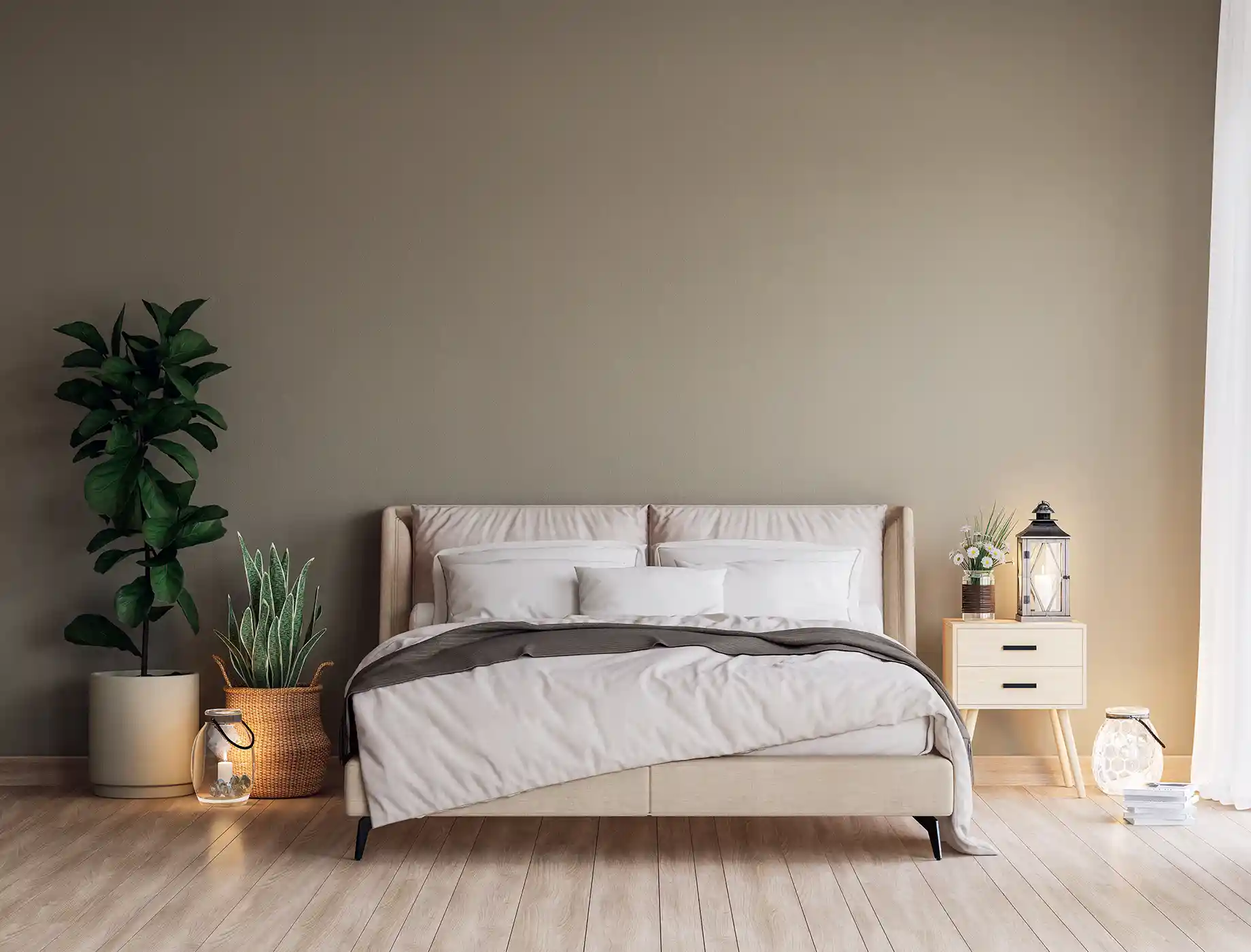 Cozy bedroom featuring a beige bedspread, minimalist nightstand, and decorative plants. The wall is painted with Nippon Paint's soothing color, enhancing the serene atmosphere. Soft lighting from lanterns complements the warm wooden floor.